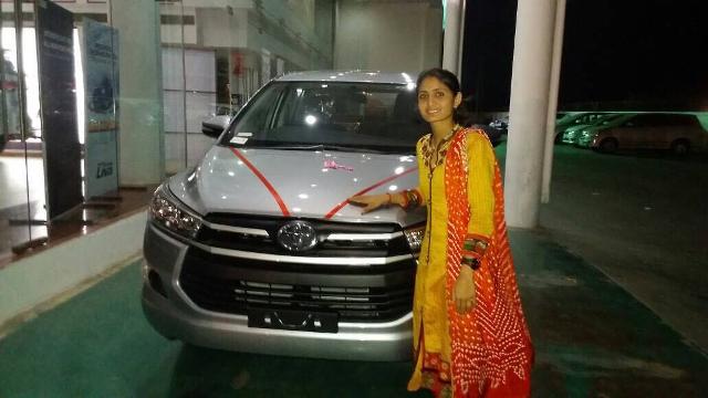 Geeta Rabari with her Toyota Innova