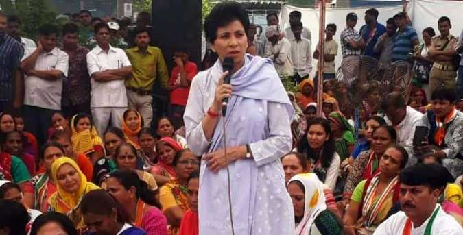 Selja Kumari speaking at a gathering