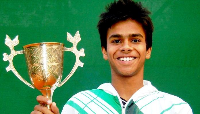 Sumit Nagal after winning a tennis tournament during his childhood