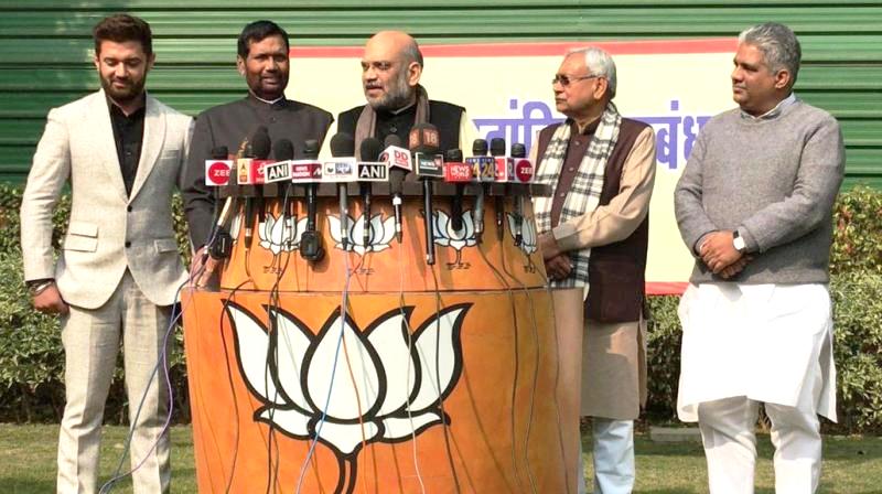 Chirag Paswan (extreme left) with Ram Vilas Paswan (left), Amit Shah (centre) and Nitish Kumar (right) announcing LJP & BJP's alliance