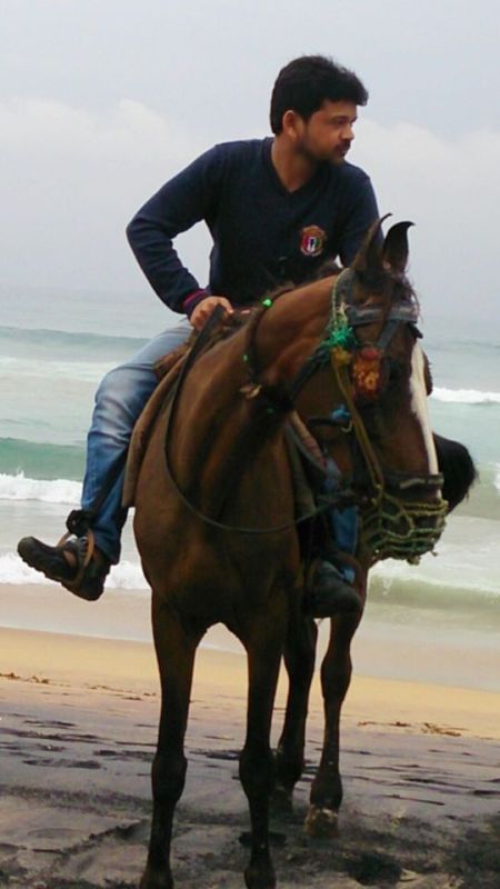 Jogi Naidu riding a horse