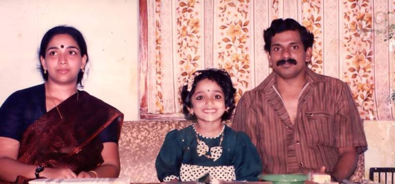 Kavya Madhavan with her Father and Mother as a Child