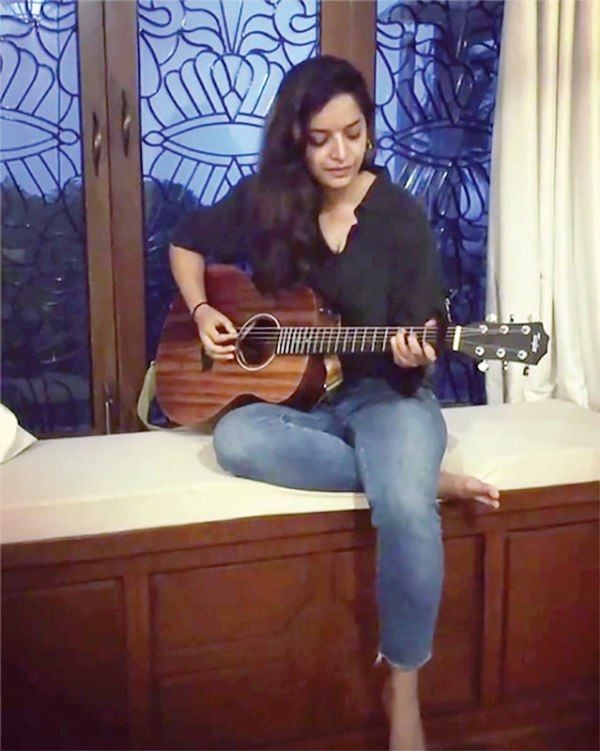 Lisa Mishra Playing Guitar