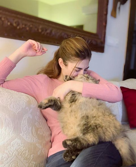 Naimal Khawar with her pet cat