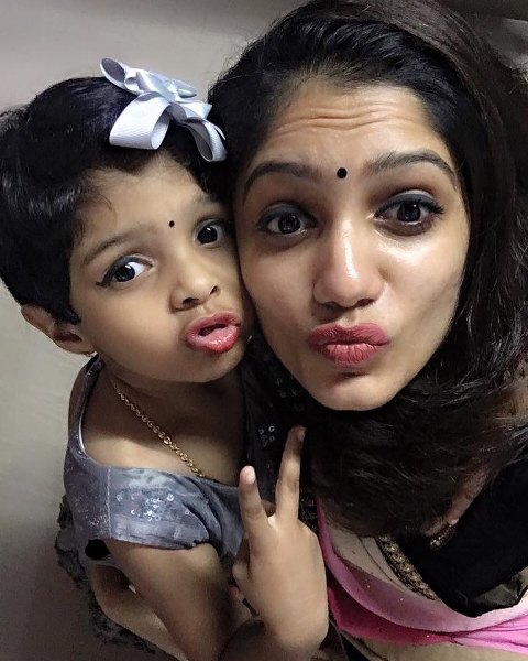 Arya Rohit with her daughter