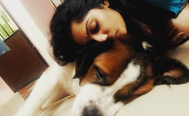 Arya Rohit with her pet dog