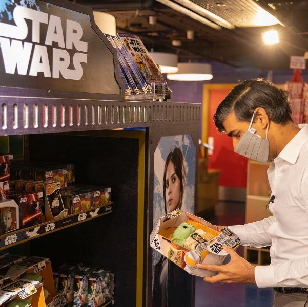 Rishi Sunak in the Star Wars section in a toy shop