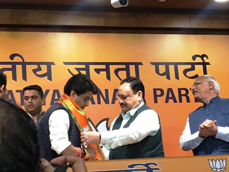 BJP president JP Nadda formally inducts Jyotiraditya Scindia into the BJP at the party headquarters in New Delhi, 11 March 2020