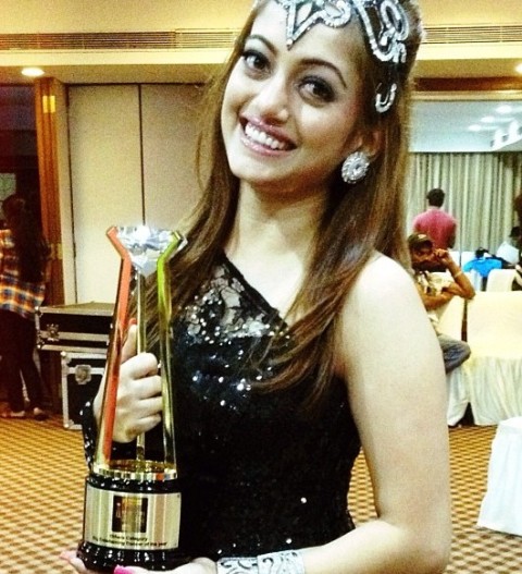 Manasi Naik with an award