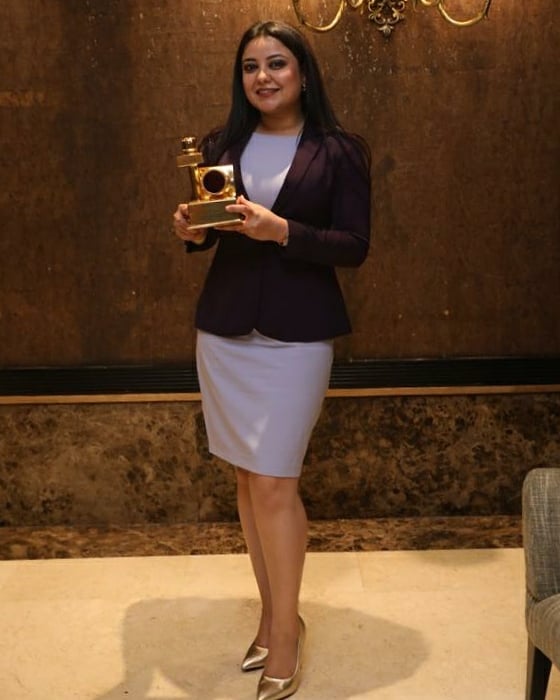 Madhuri Kalal with her award