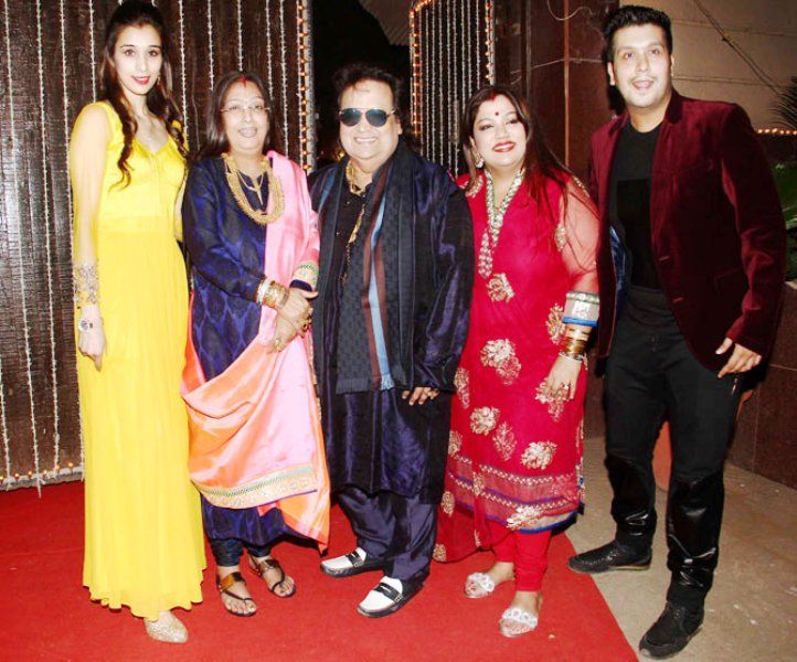 Bappi Lahiri With His Son, Daughter, Wife, and Daughter-in-Law (from right)