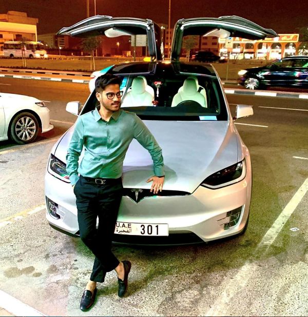 Manan Shah Infront of His Car