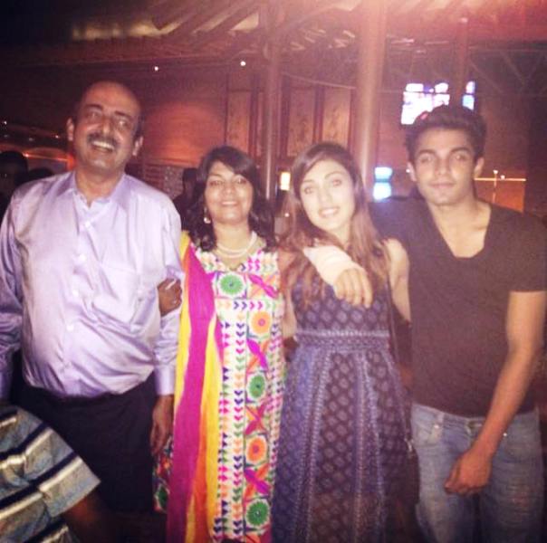 Rhea Chakraborty With Her Family
