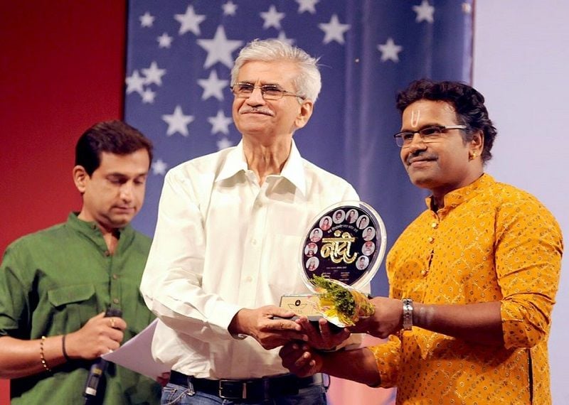 Hrishikesh Joshi Receiving an Award