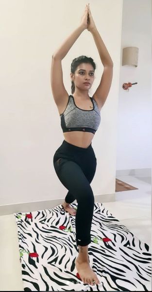 Dharsha Gupta doing Yoga