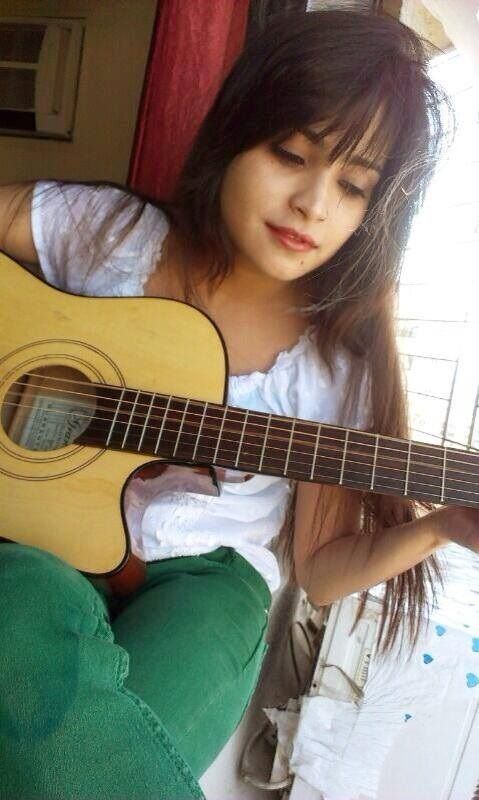 Harsha Khandeparkar Playing The Guitar