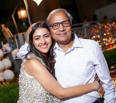 Priyanka Chaudhary Raina with her father 