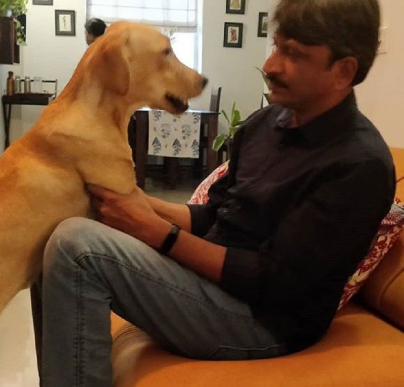 Rajesh Tailang With His Pet Dog