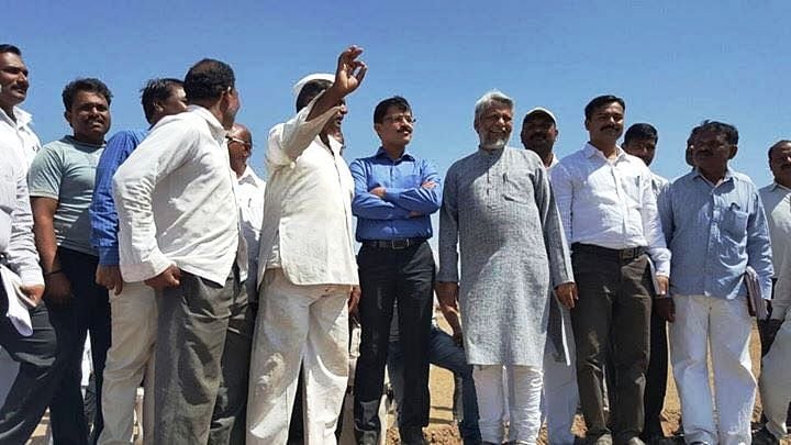 Tukaram Mundhe along with waterman of India, Shri Rajendra Singh, inspecting the water conservation work in Solapur