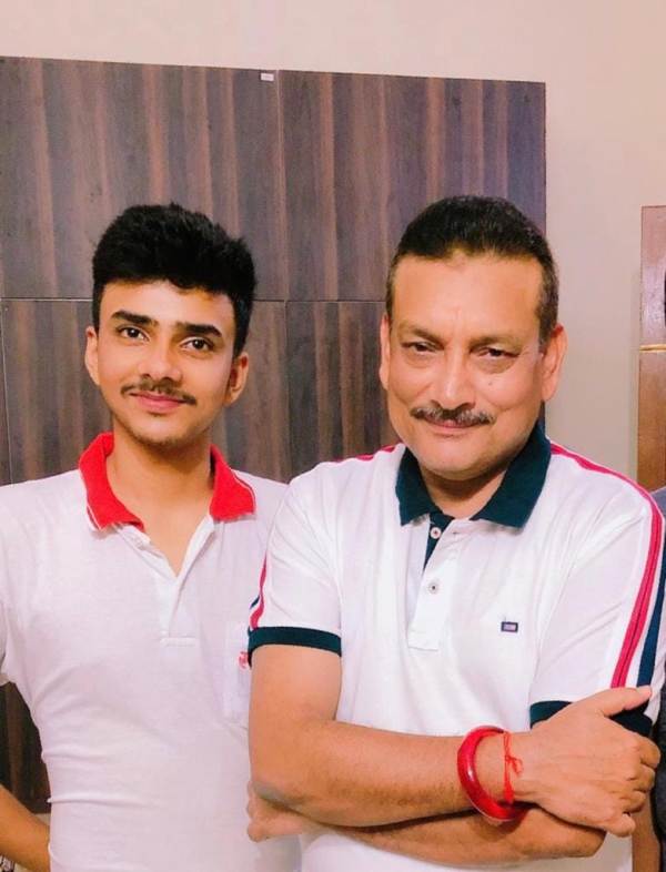 Gupteshwar Pandey with his son
