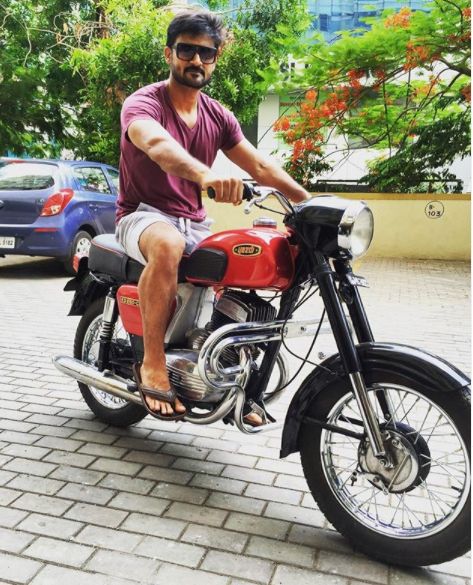 Manav Gohil riding his bike