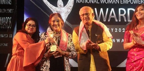 Sharbari Dutta Receiving an Award