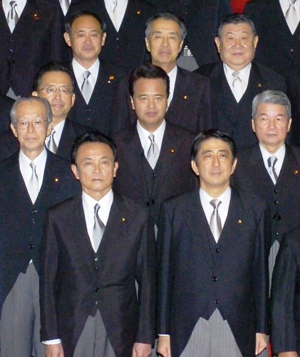 Yoshihide Suga (back row, far left) during a photo session for newly appointed Cabinet ministers under the first administration of Prime Minister Shinzo Abe in 2006