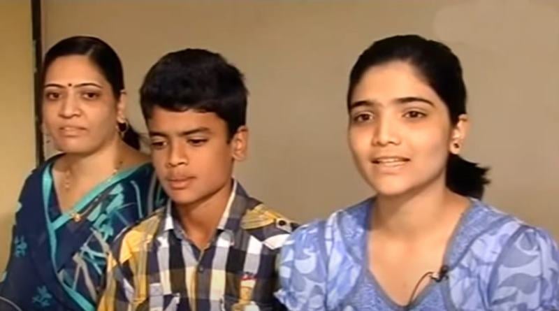 14 years old Digvijay Deshmukh with his mother and elder sister