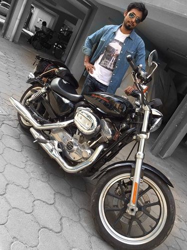 Aari Arjuna With His Motorcycle