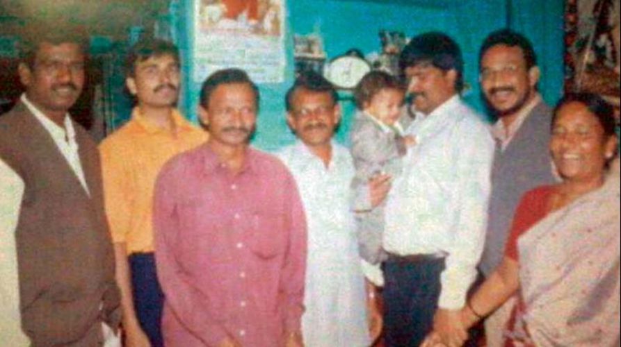 Bezawada Wilson (second from right) with his siblings, Yesupadam, Mark, and Annamma at their KGF house