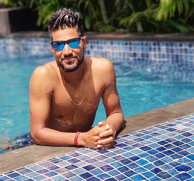 Lalit Yadav during a photoshoot in a swimming pool