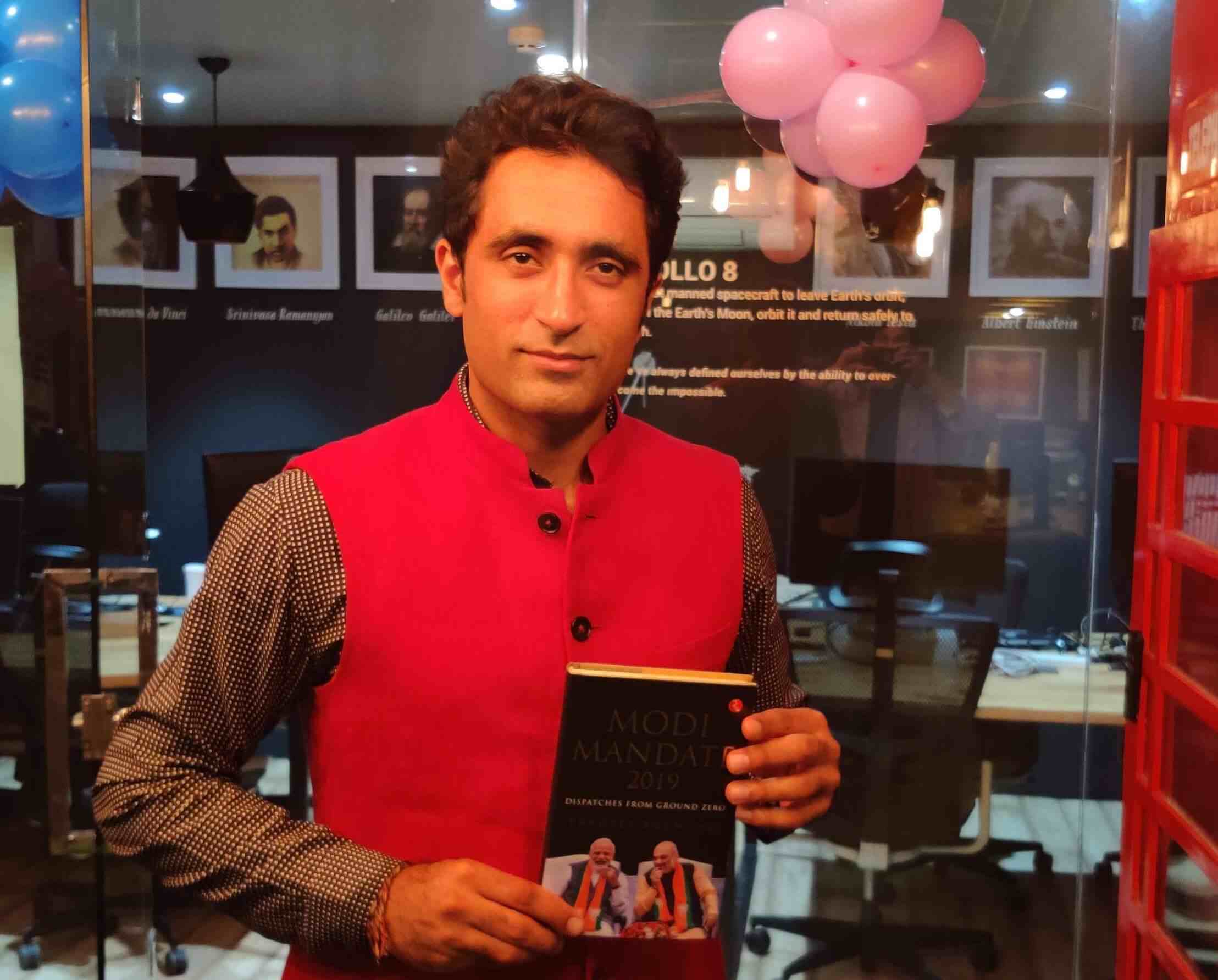 Pradeep Bhandari with his book 
