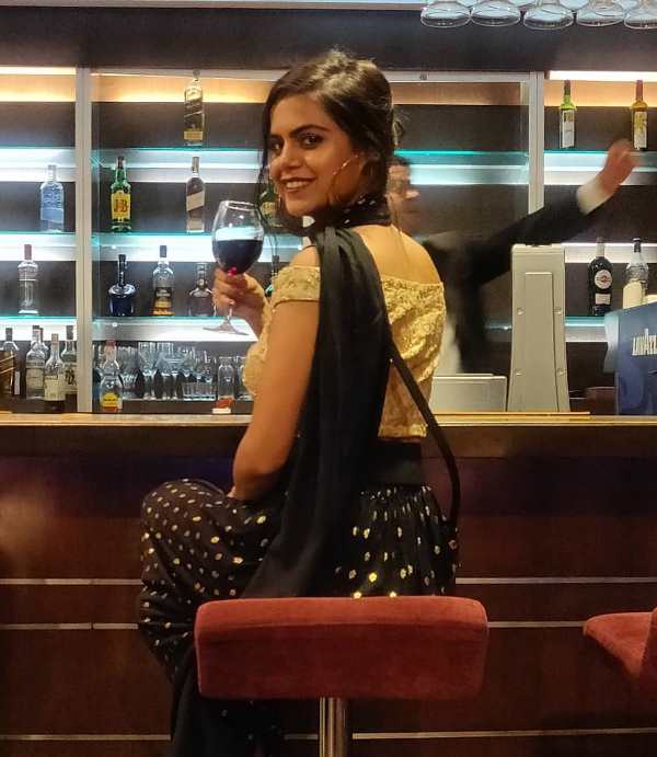 Prashansa Sharma enjoying a drink