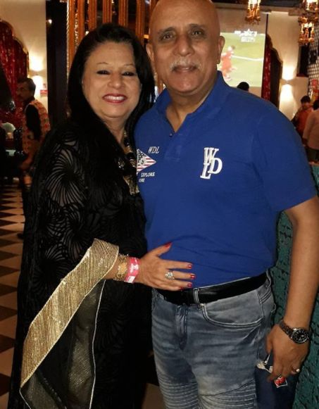 Rajesh Puri and his wife