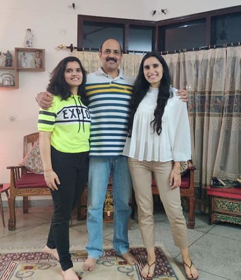 Srishti Sudhera with her sister and father