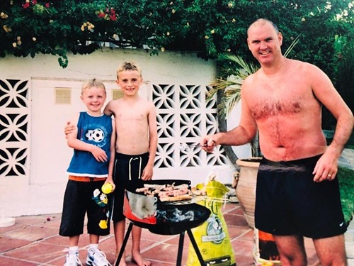 Tom Banton with his brother and father during a barbecue