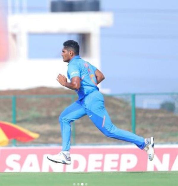 Tushar Deshpande bowling during an India A match