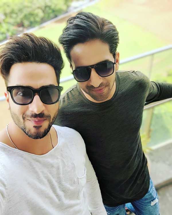 Aly Goni with his brother