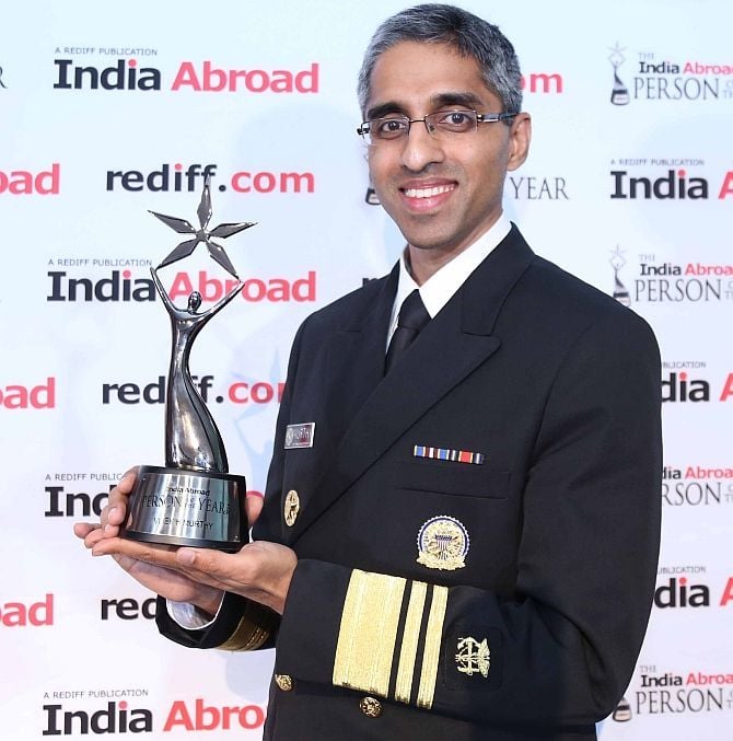 Dr Vivek H Murthy showing his India Abroad Person of the Year 2014 award at the National Museum of the Indian American in New York City