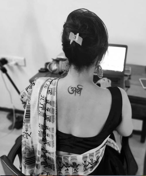 Swati Kumari back tattoo