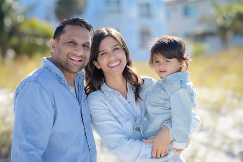 Family picture of Ravi Patel with his wife and daughter