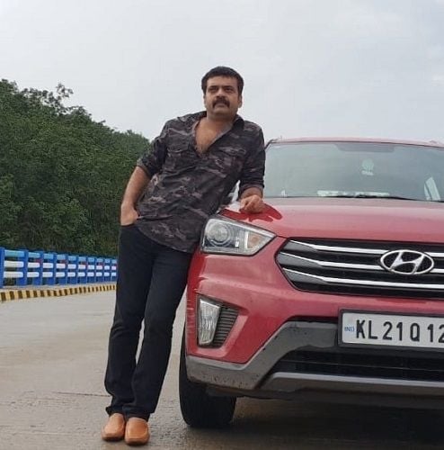 Anil Nedumangad with his Car