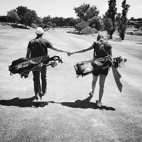 Devon Conway and Kim Watson together during a golf game