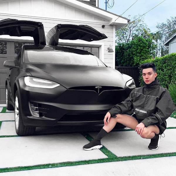 James Charles with his car