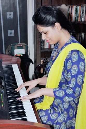 Manisha Shukla playing the Piano