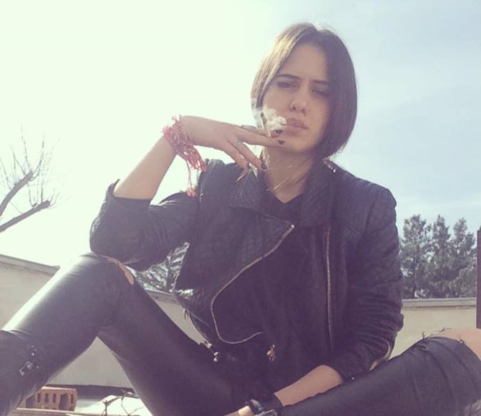 Maria Bakalova smoking a Cigarette