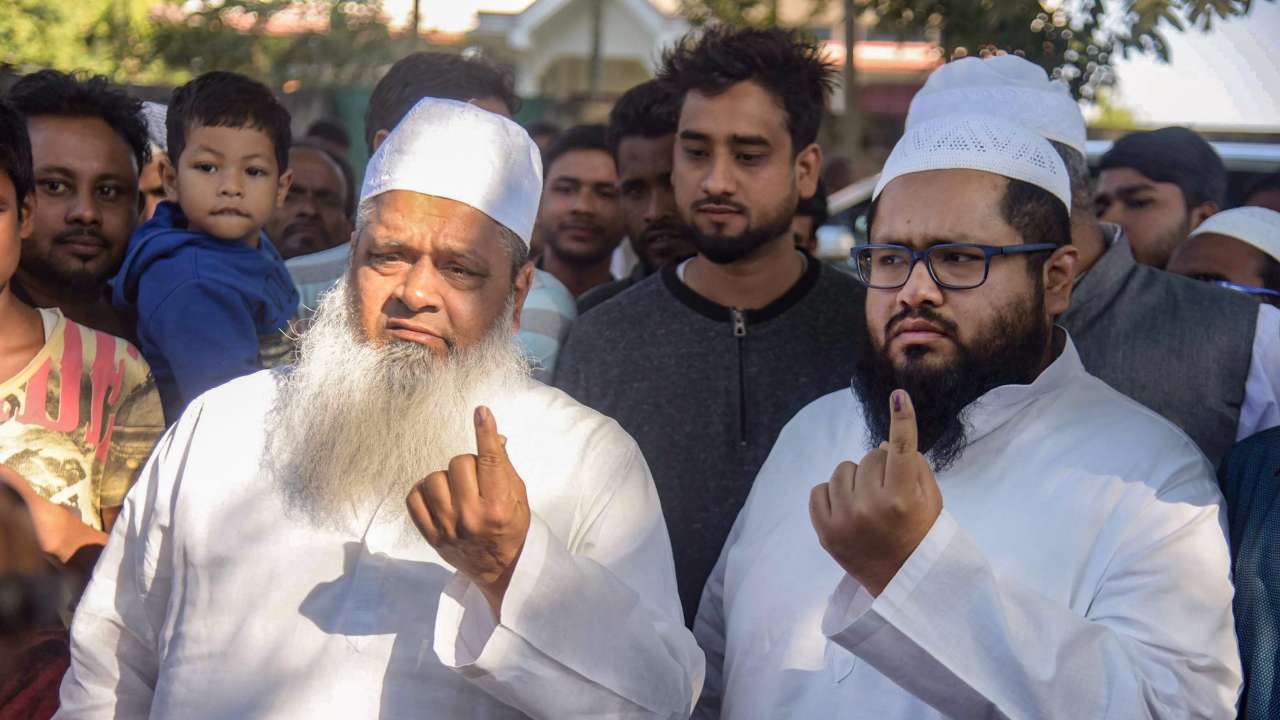 Maulana Badruddin Ajmal with his son Maulana Abdur Rahim Ajmal, after casting votes in Assam panchayat election 2018