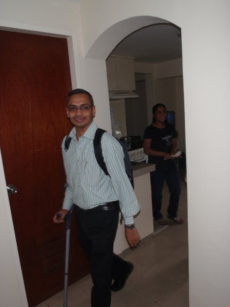 A picture from 2009 showing Deependra Singh walking with the help of a crutch