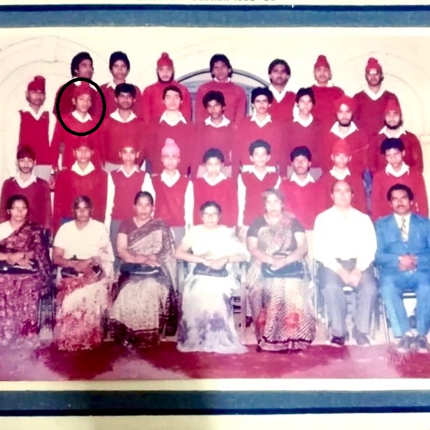 A school group photo featuring Gurdeep Ghuggi (face encircled)