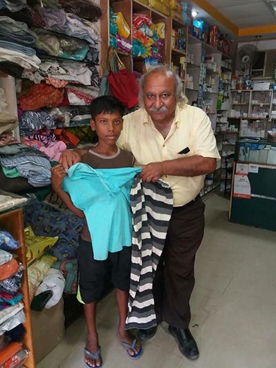 Anoop Khanna giving clothes at Sadbhavna Store